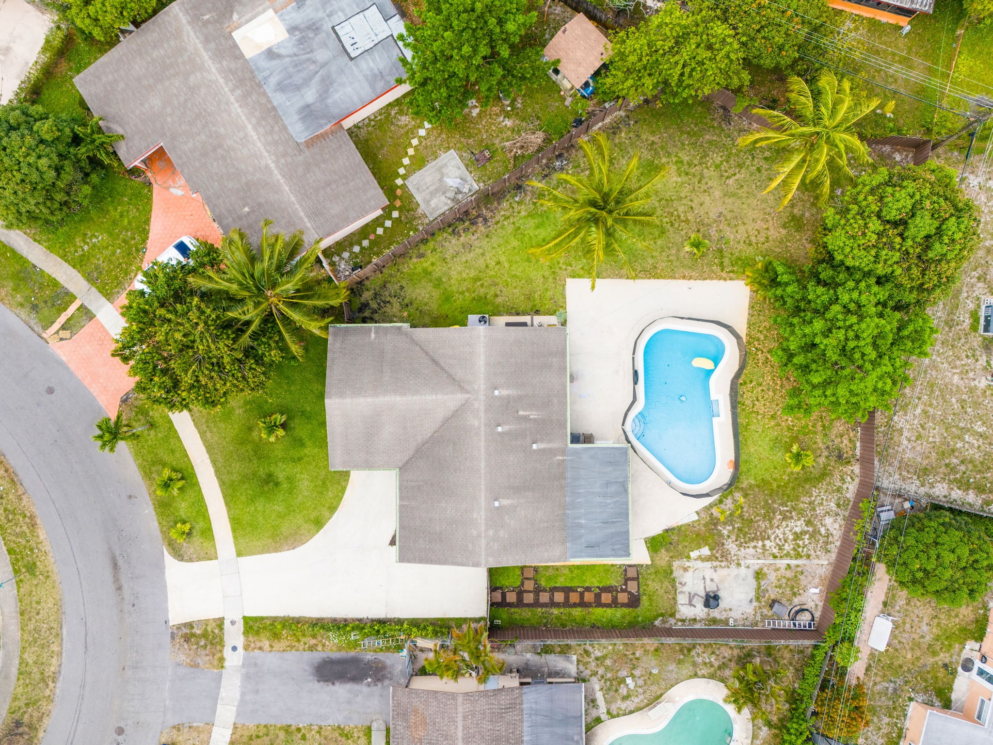 Aerial drone view of the house and pool
