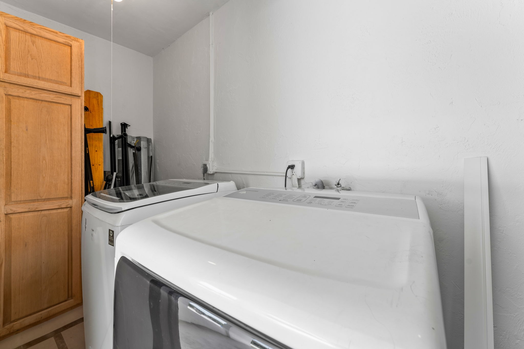 Laundry room with washer and dryer